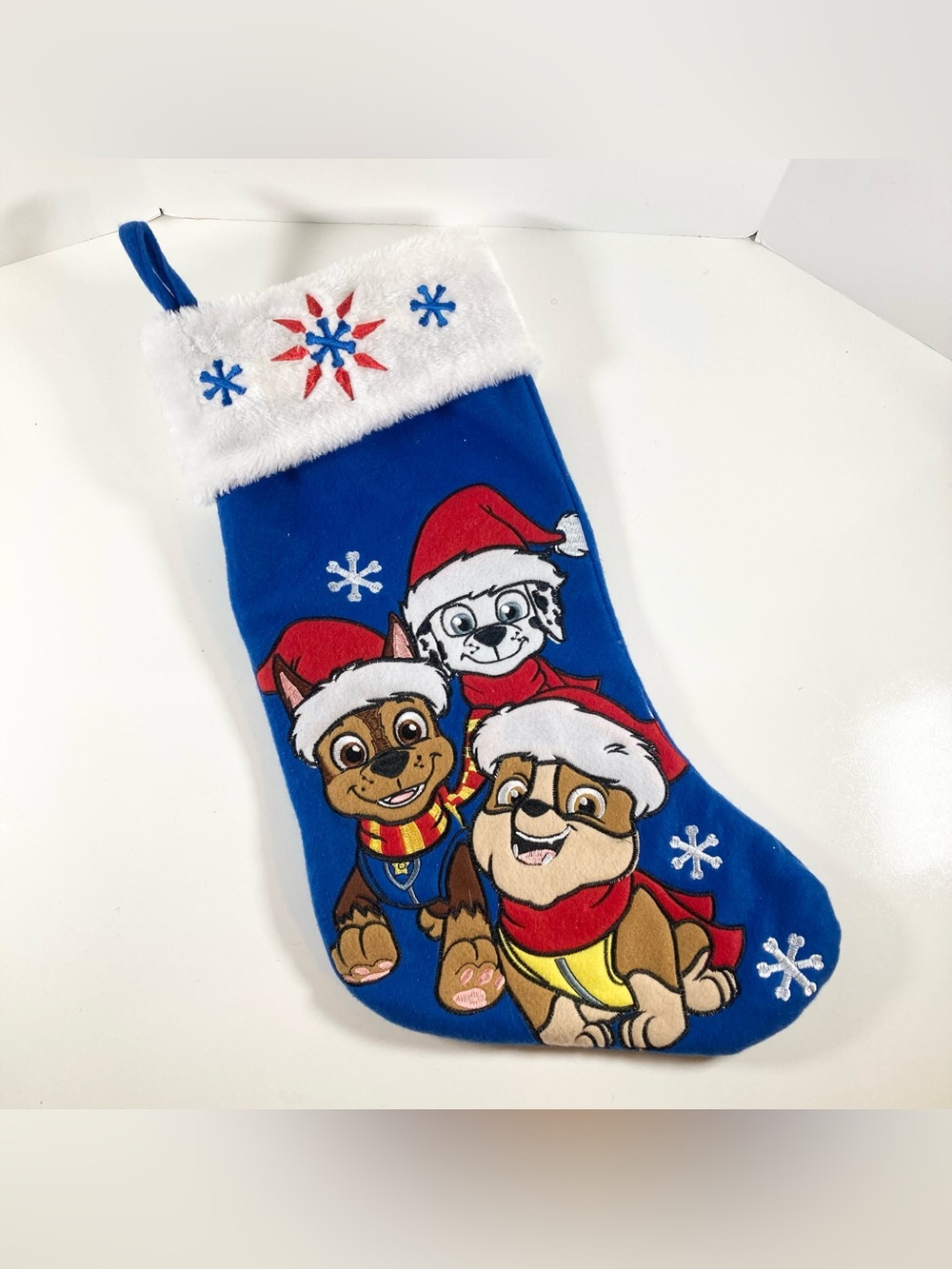 Paw Patrol Blue Christmas Stocking with  Chase Rubble Marshall on it